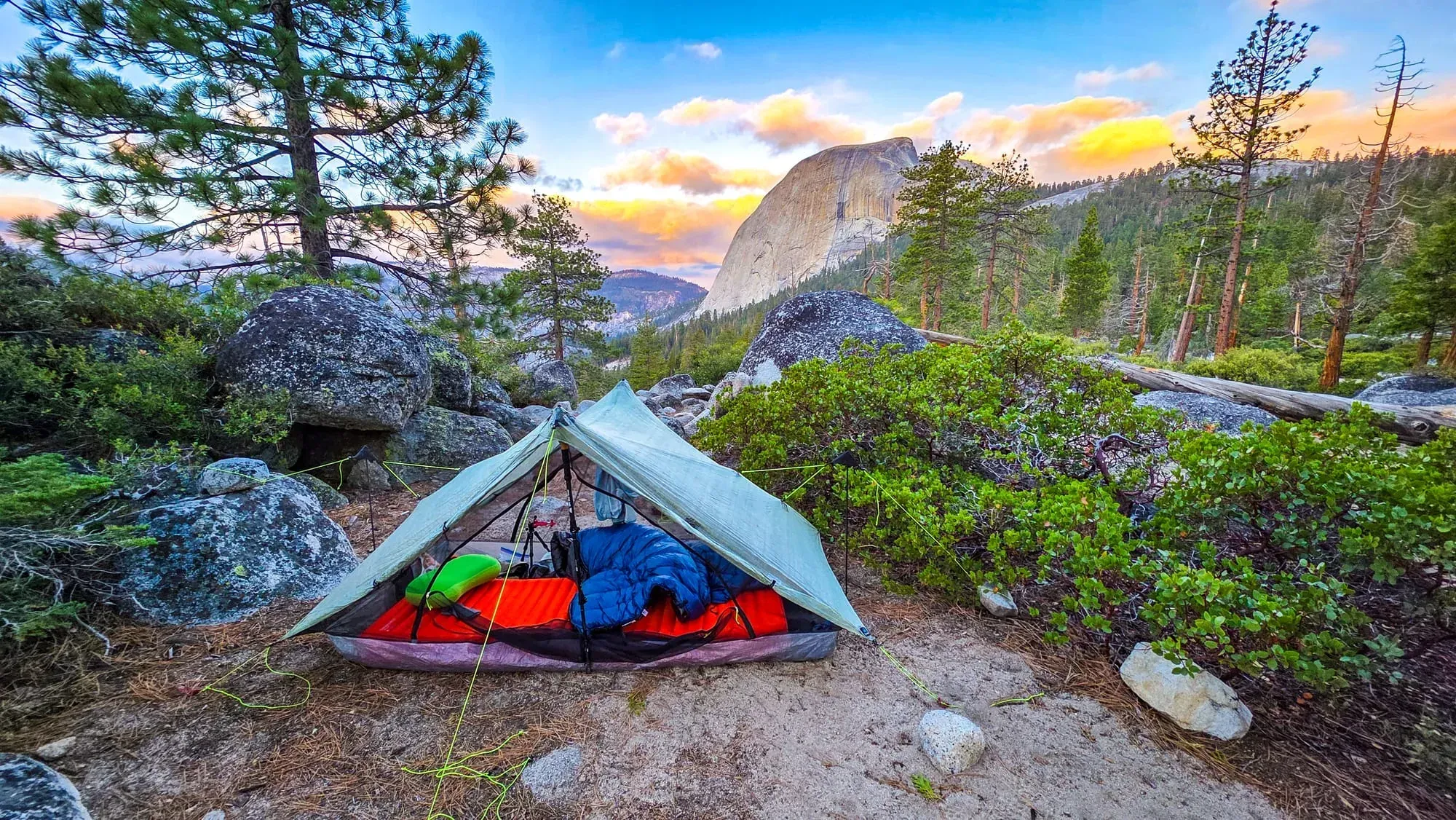 Backpacking camp at sunset with Half Dome in the distance, Yosemite backcountry