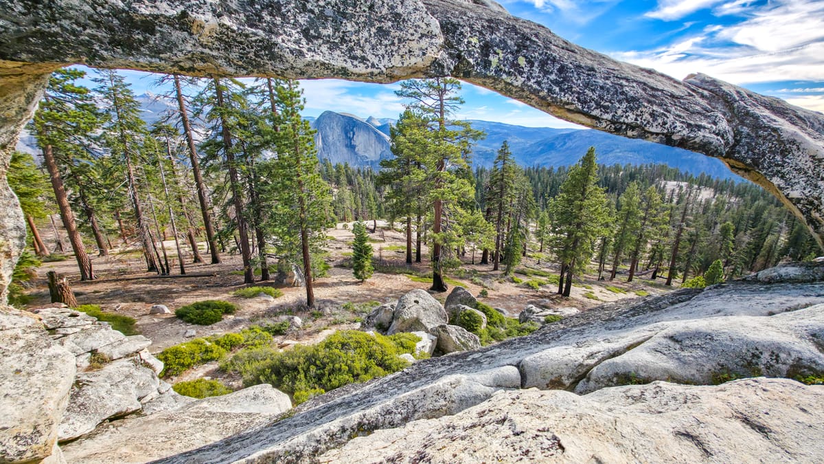 Half Dome viewed through Indian Arch during a Yosemite.Life backpacking trip