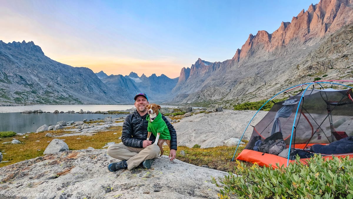 Eric Kufrin and his dog Kali backcountry camping in Bridger Wilderness of Wyoming's Wind River Range